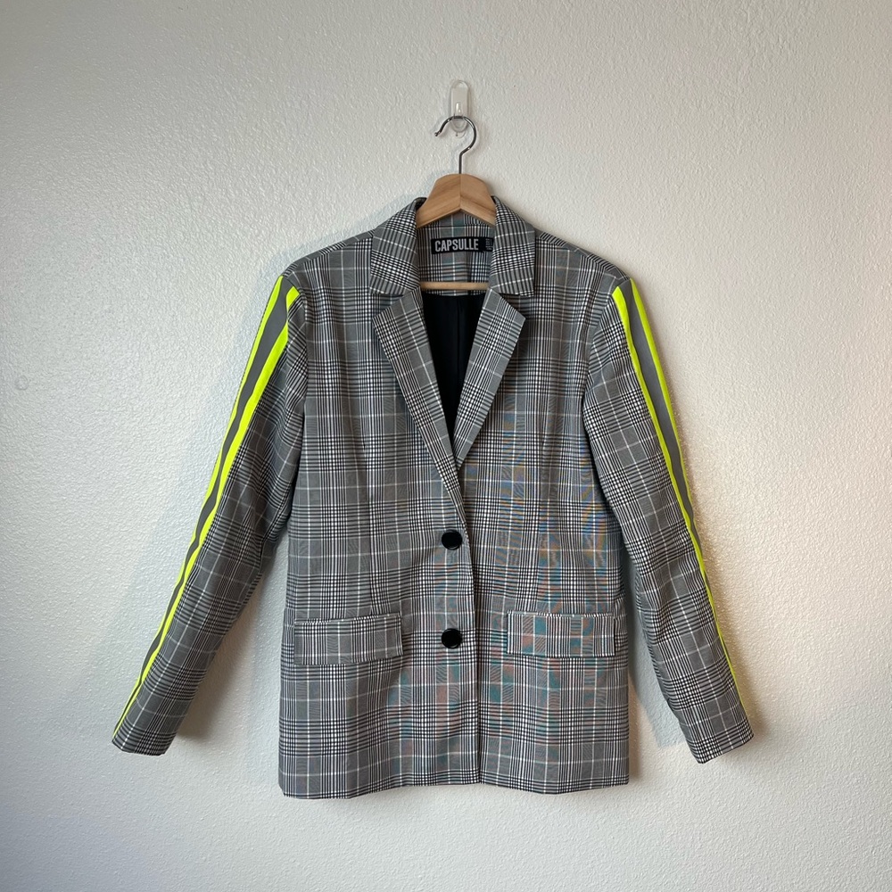 Black and white plaid blazer with reflective neon sleeves